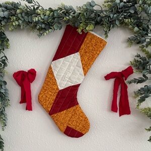 Festive Patchwork Christmas Stocking - Red, Orange, and White